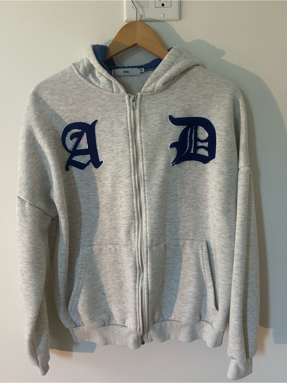 Adika Light Gray Zip-Up Hoodie with Navy Lettering